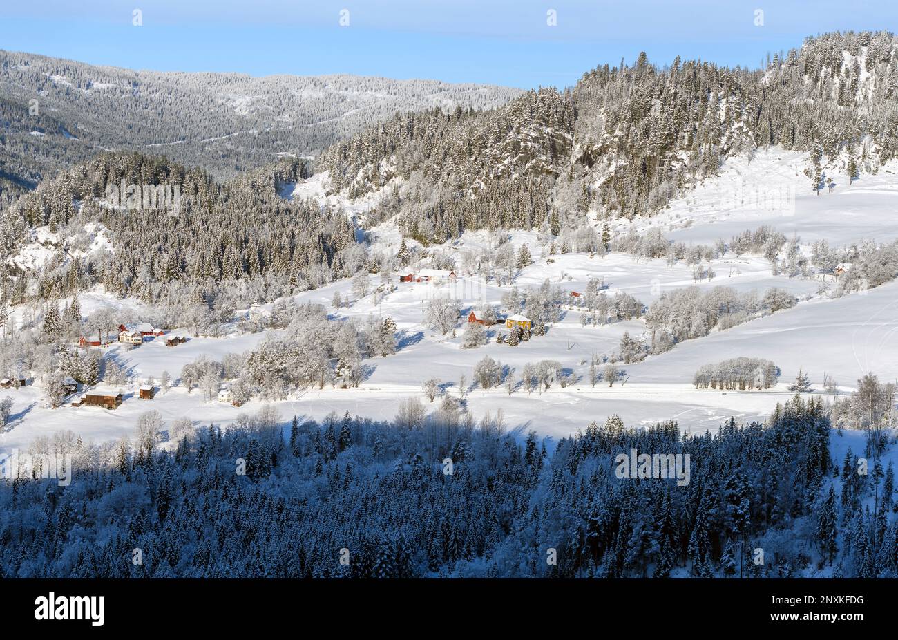 The small community of Nesland (Vinje, Telemark and Vestfold), Norway on a winter's day in late February. Stock Photo