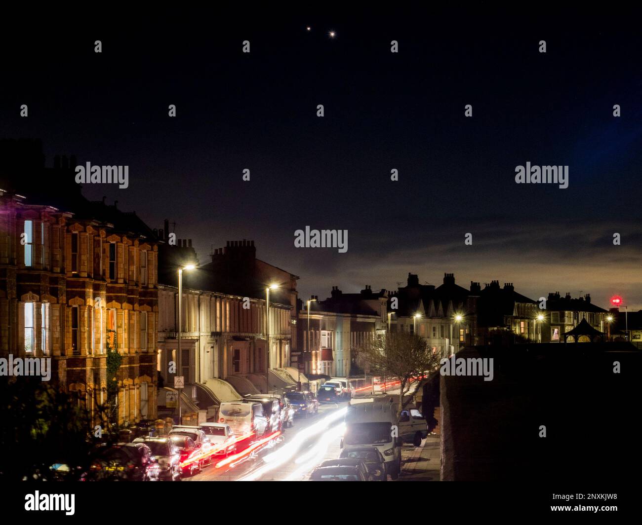 Sheerness, Kent, UK. 1st Mar, 2023. UK Weather: planets Jupiter (left) and Venus (right) seen next to each other in a conjunction in the night sky above Sheerness, Kent this evening. Credit: James Bell/Alamy Live News Stock Photo
