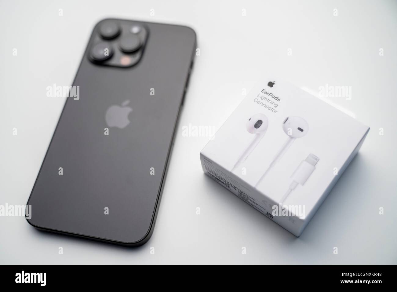 New iPhone 14 pro max and Apple Earpods Airpods white earphones