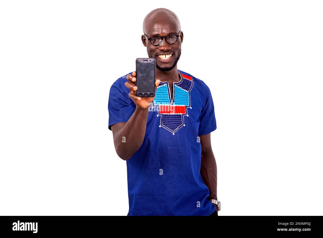 portrait of a business man wearing glasses, showing his mobile phone ...