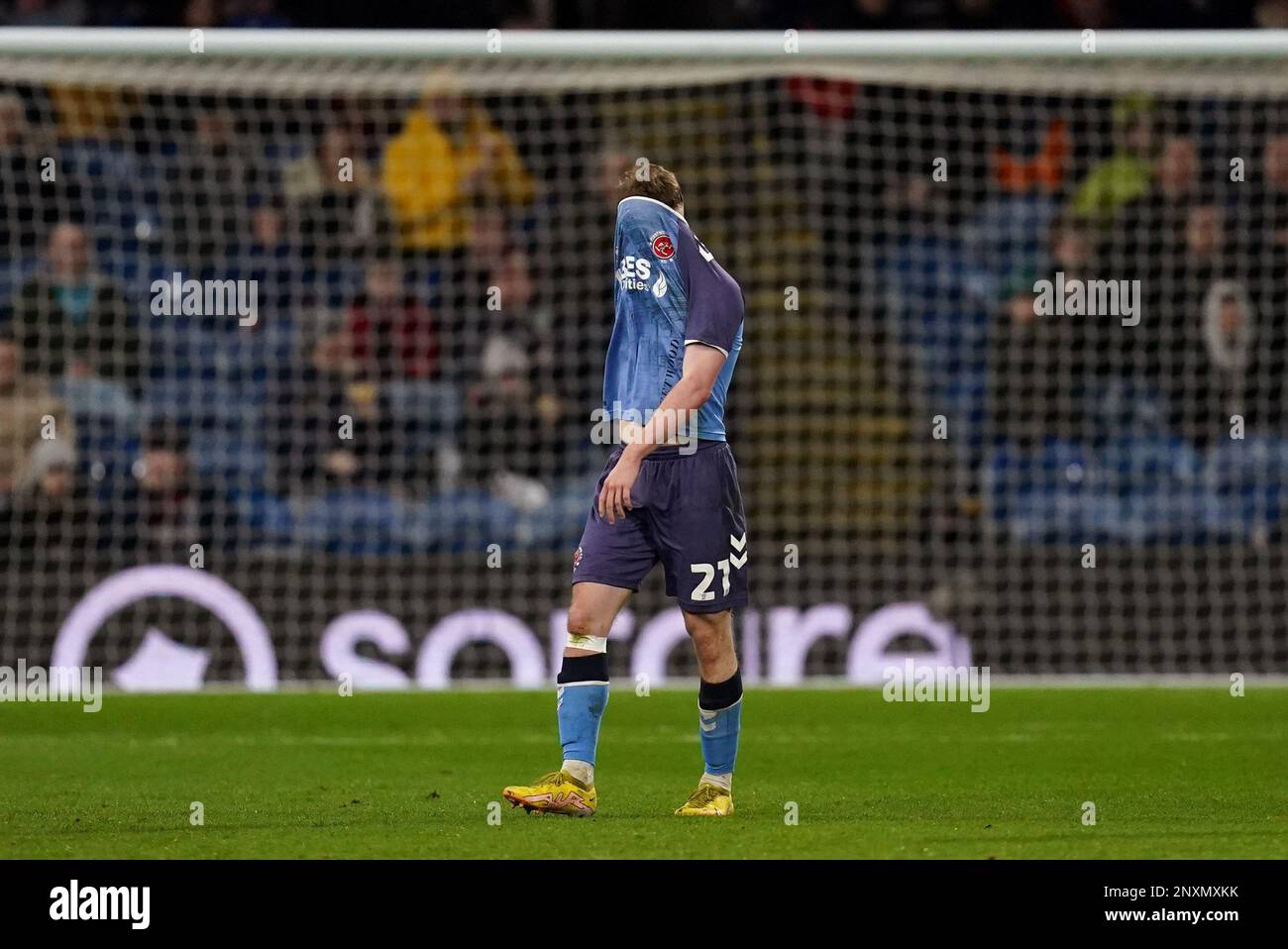 Fleetwood Town's Cian Hayes leaves the pitch after being shown a red ...