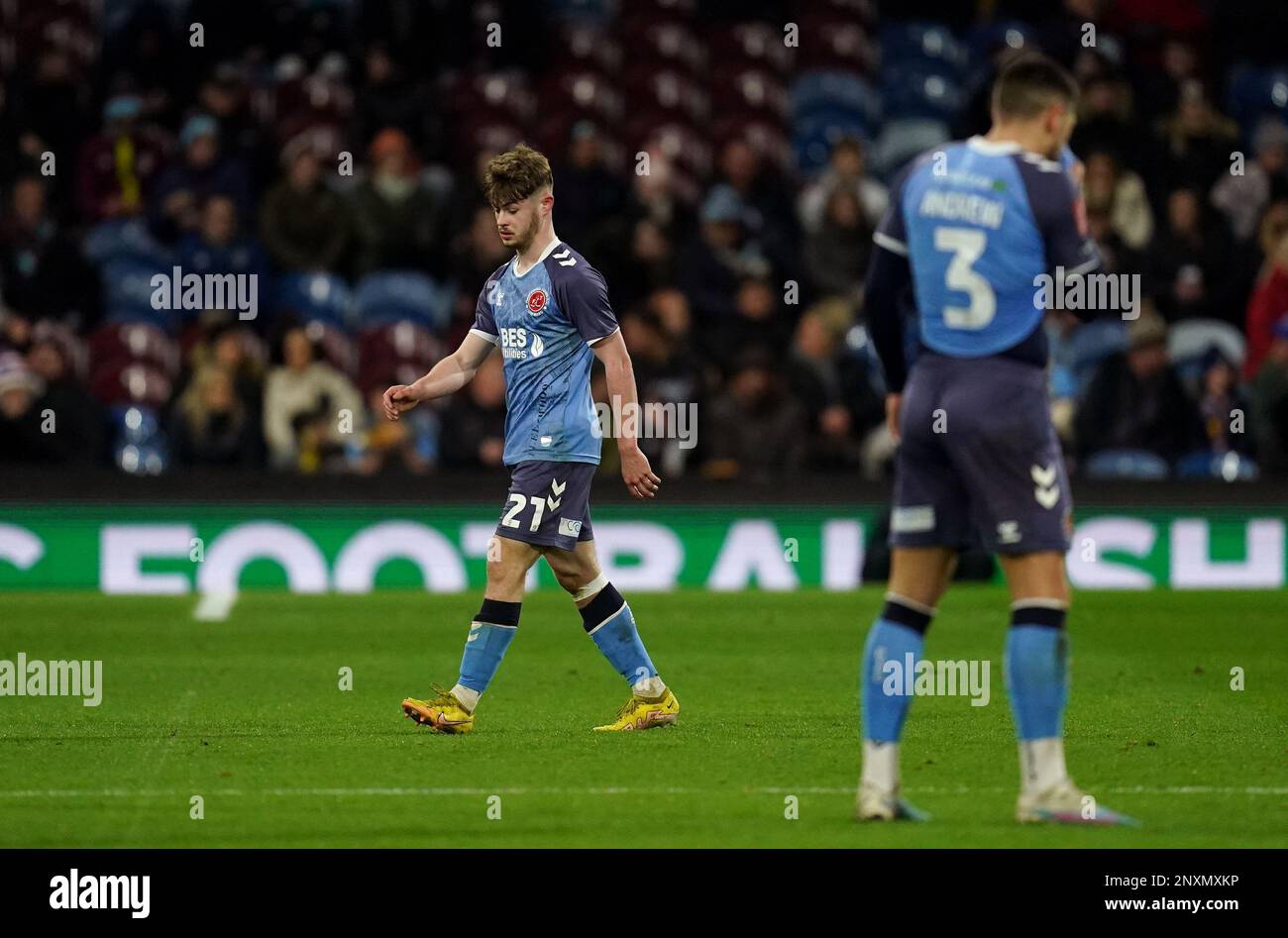 Fleetwood Town's Cian Hayes leaves the pitch after being shown a red ...