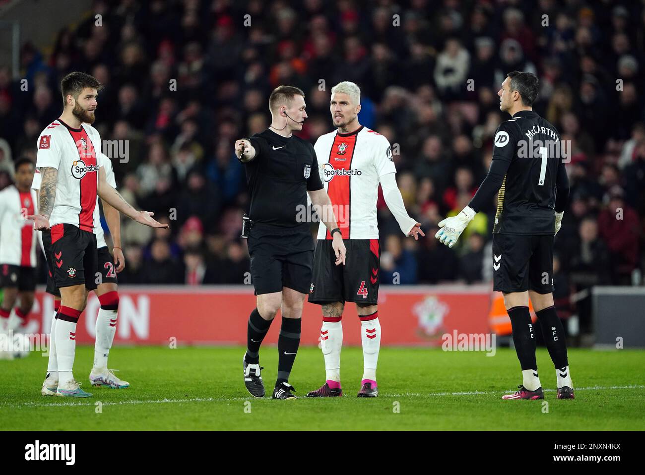 Referee Thomas Bramall awards a penalty to Grimsby Town for a foul by Southampton's Duje Caleta-Car during the Emirates FA Cup fifth round match at St. Mary's Stadium, Southampton. Picture date: Wednesday March 1, 2023. Stock Photo