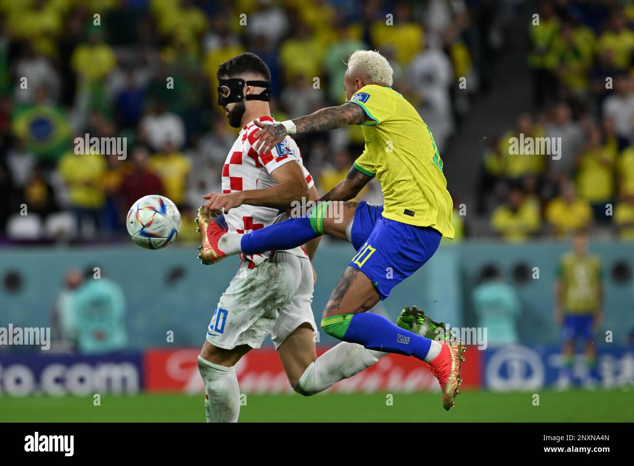 Neymar Jr. (Brazil) battles Joško Gvardiol (Croatia) for the ball in Croatia's 1-1 (4-2) quarter-final victory over Brazil in the 2022 FIFA World Cup. Stock Photo