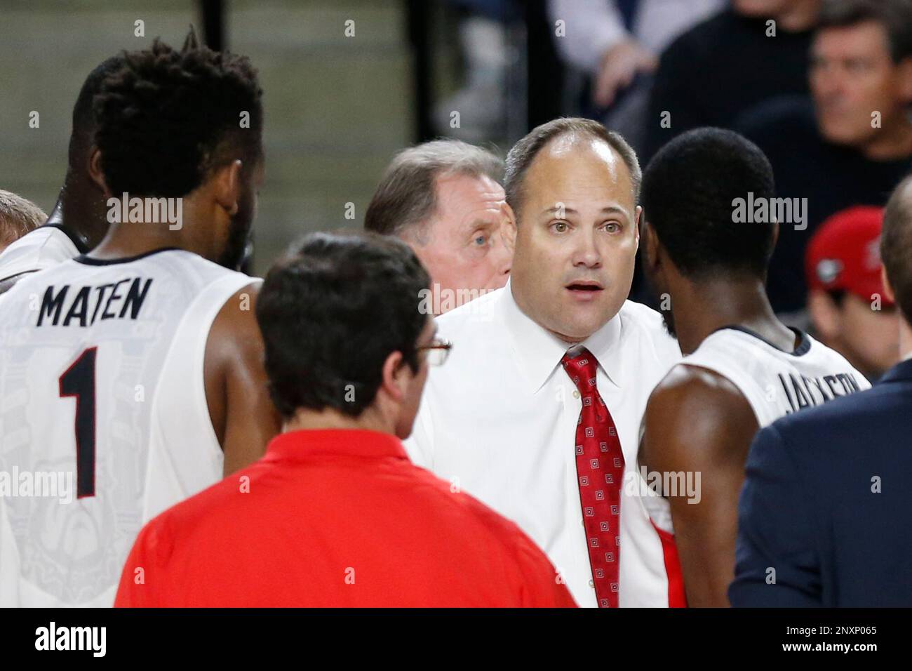 coach Mark Fox speaks with this team during a timeout in the