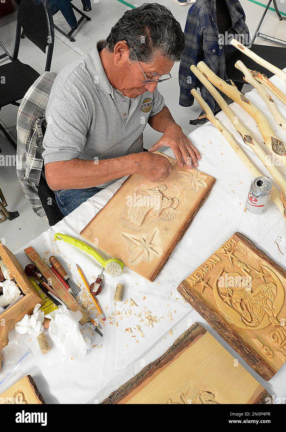 In a Friday, Jan. 12, 2018 photo, Joe Espinoza works on a creation