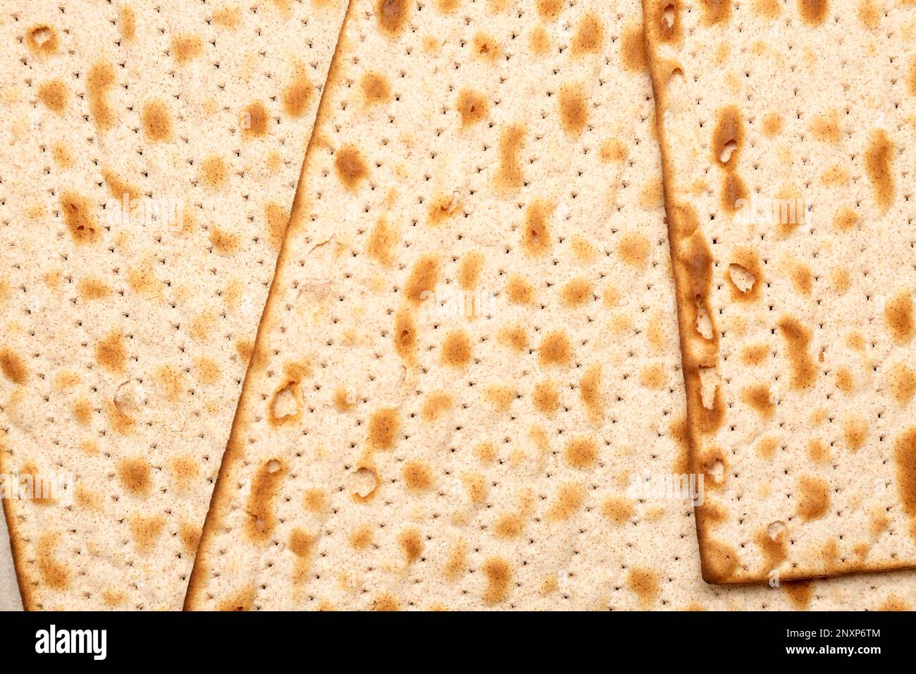 Jewish flatbread matza for Passover as background, closeup Stock Photo Alamy