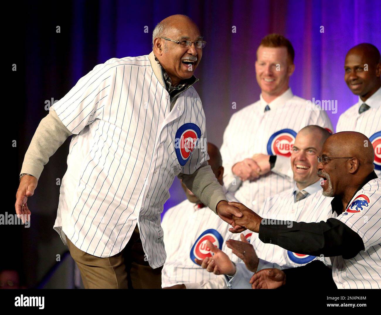 Chicago Cubs great Billy Williams (left) looks over at new Manager