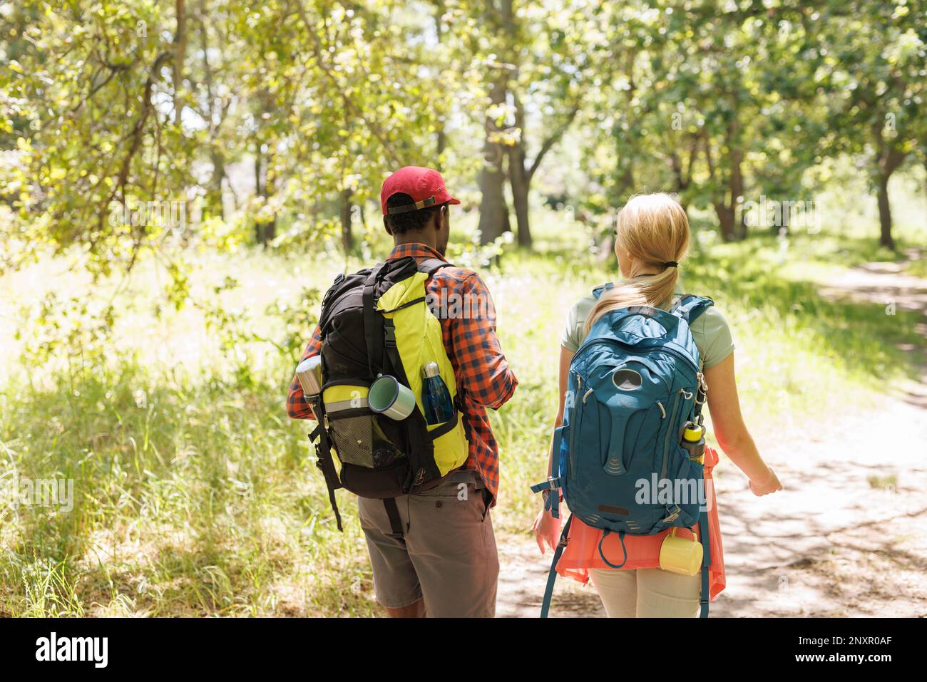 Couple park walking rear view hi-res stock photography and images - Alamy