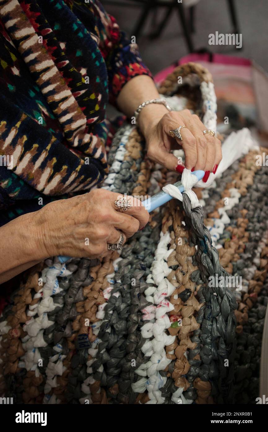 Judy Keel of Tyler makes a sleeping mat for the homeless from plastic