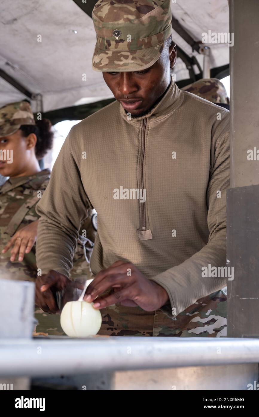 Members of the 375th Quartermaster Company (Field Feeding), HQ, 518th