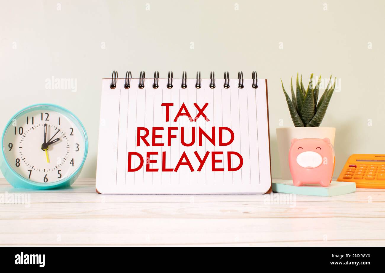 Sticky note with the text Tax Refund Delayed on Tax form