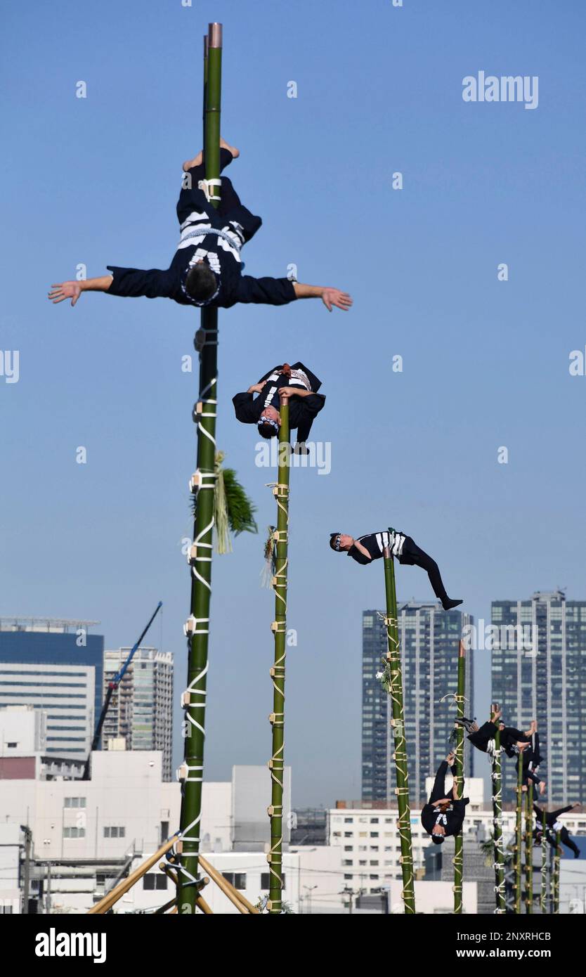 Performers Of Traditional Firefighter Show Acrobatic Ladder-climbing 