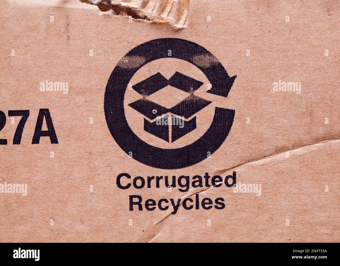 Brown Corrugated Cardboard Recycles Symbol Backgound. Stock Photo