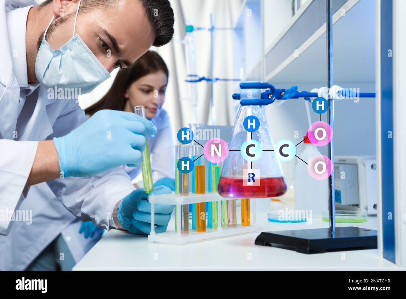 Amino Acids chemical formula, illustration. Scientist taking test tube