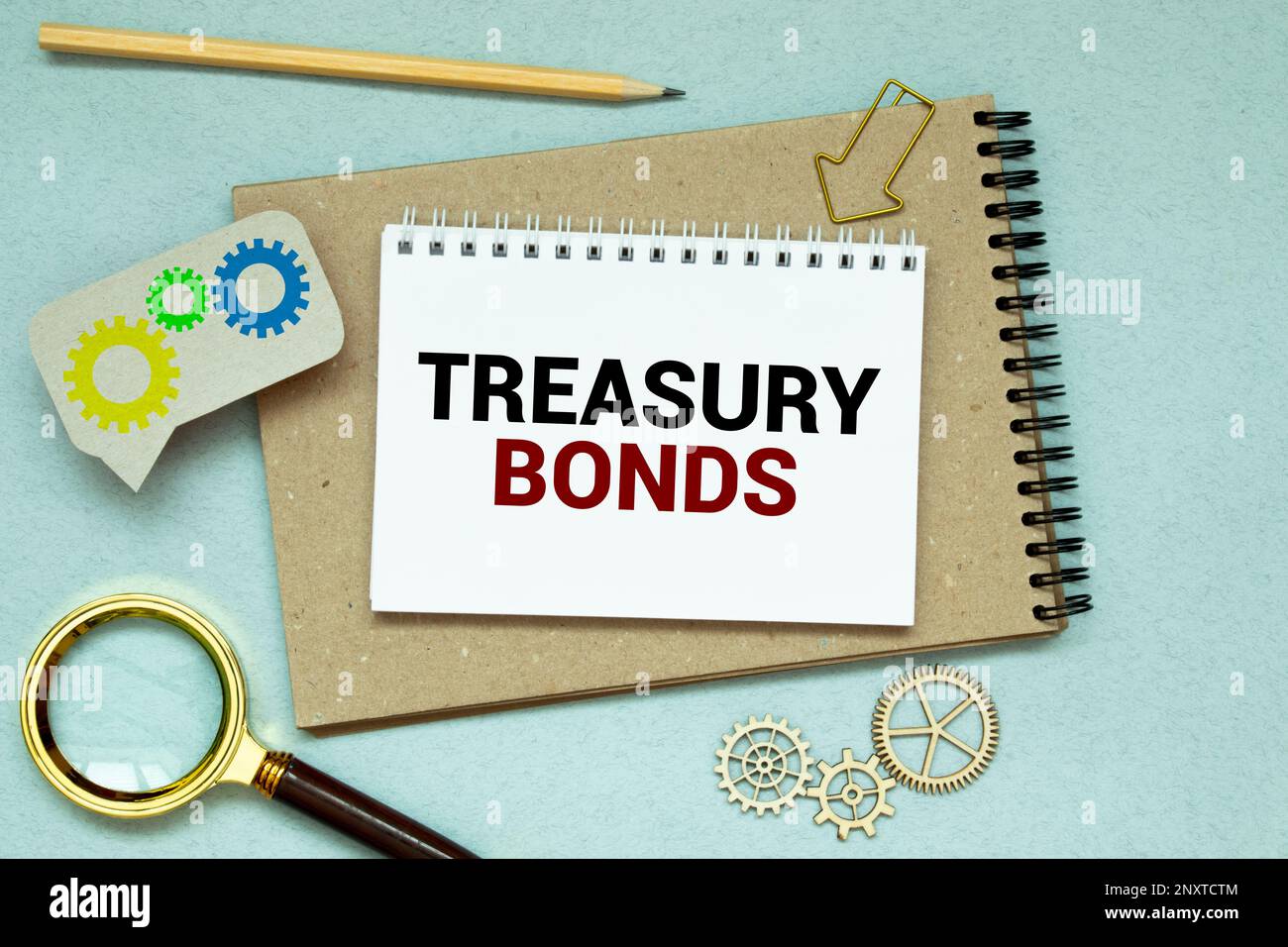 Papers with text, treasury bonds on a table, business concept Stock Photo