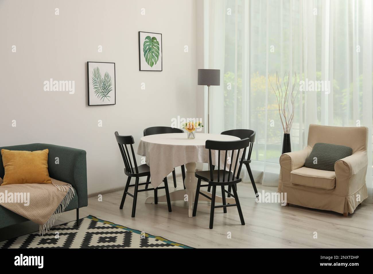 Dining table with chairs in living room. Interior design Stock Photo