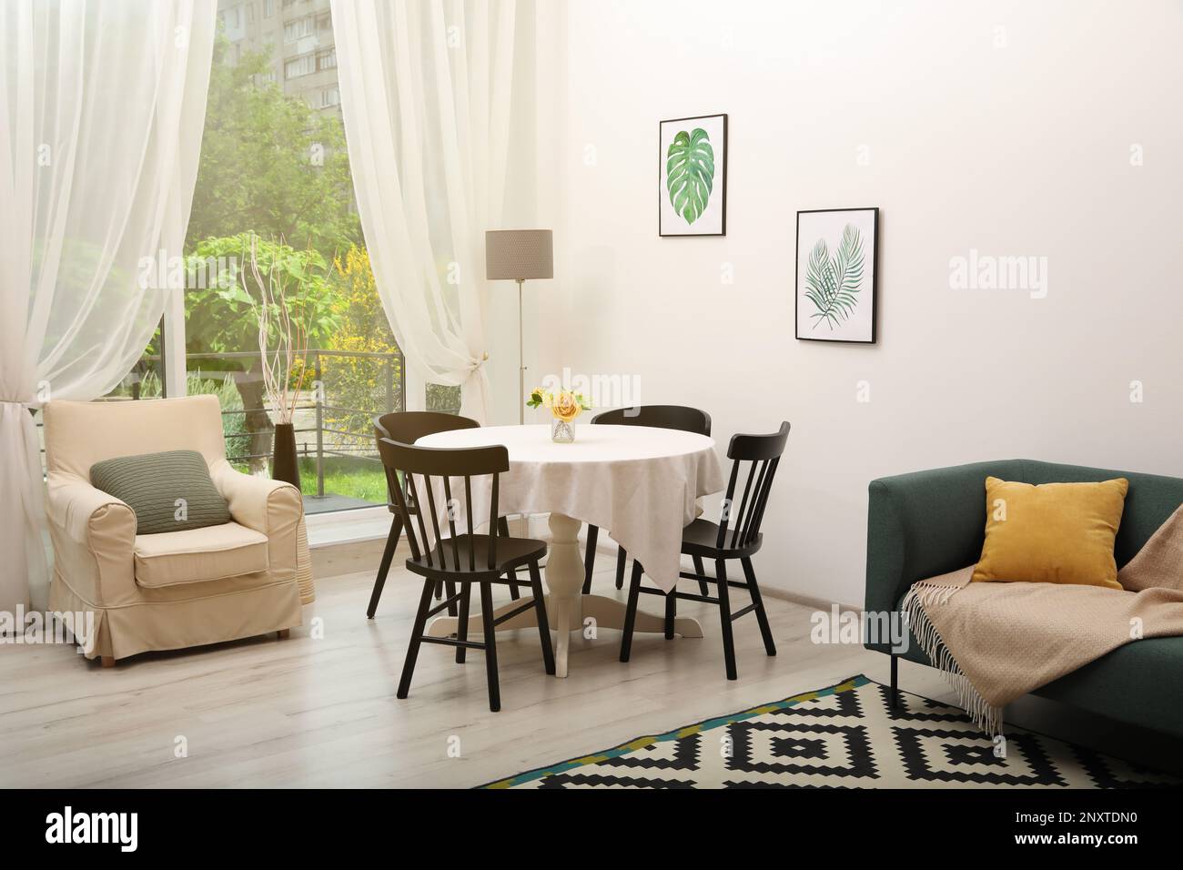 Dining table with chairs in living room. Interior design Stock Photo