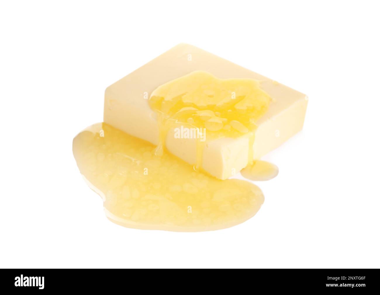 Tasty fresh melting butter on white background Stock Photo Alamy