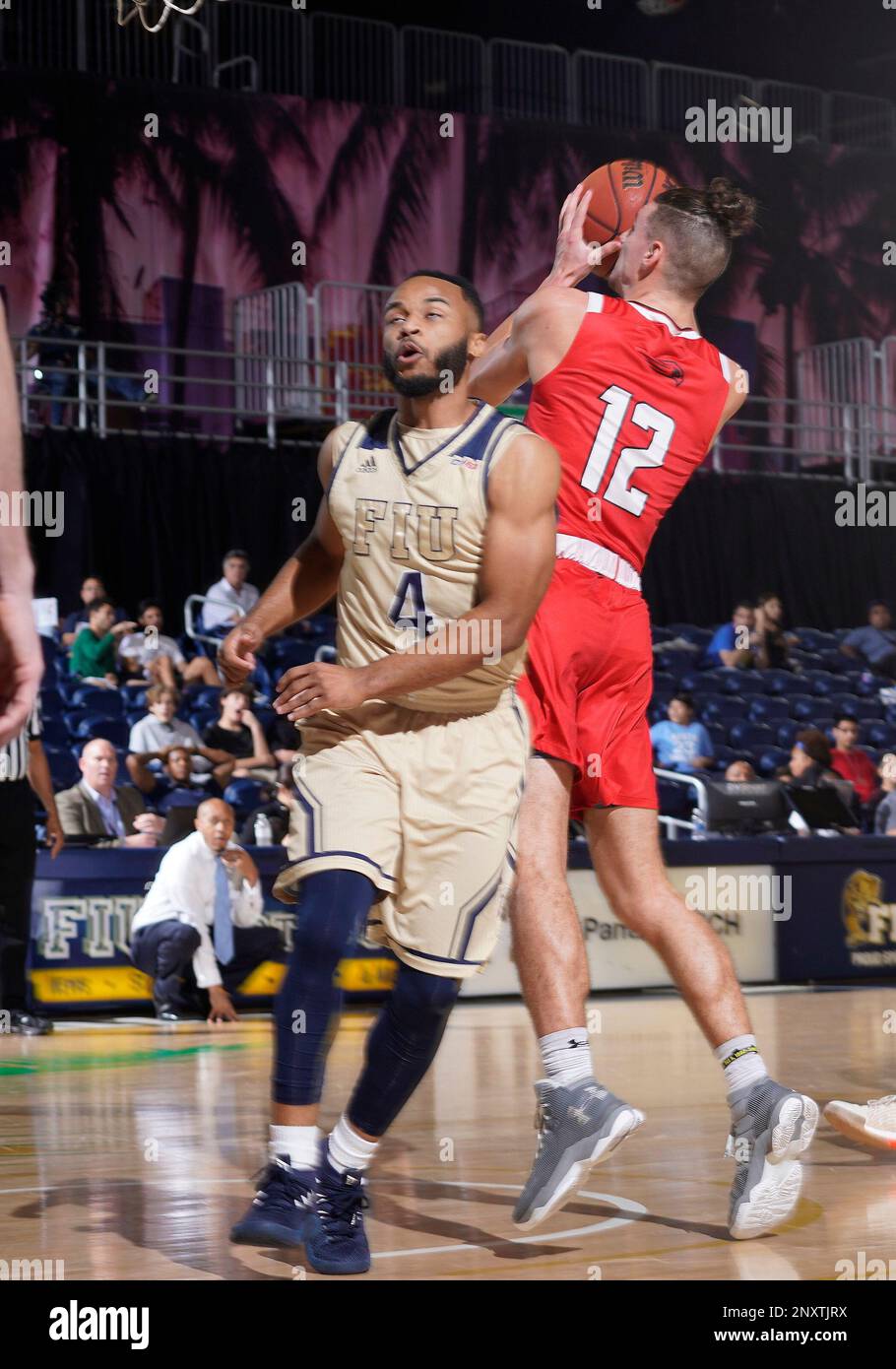 MIAMI, FL - DECEMBER 22: Hartford guard Jason Dunne (12) shoots during a  college basketball game between the University of Hartford Hawks and the  Florida International University Panthers on December 22, 2017