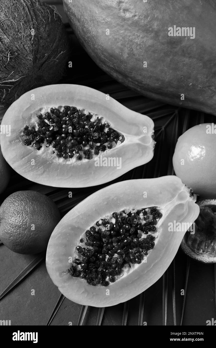 Fresh papaya and other fruits on table, flat lay Stock Photo