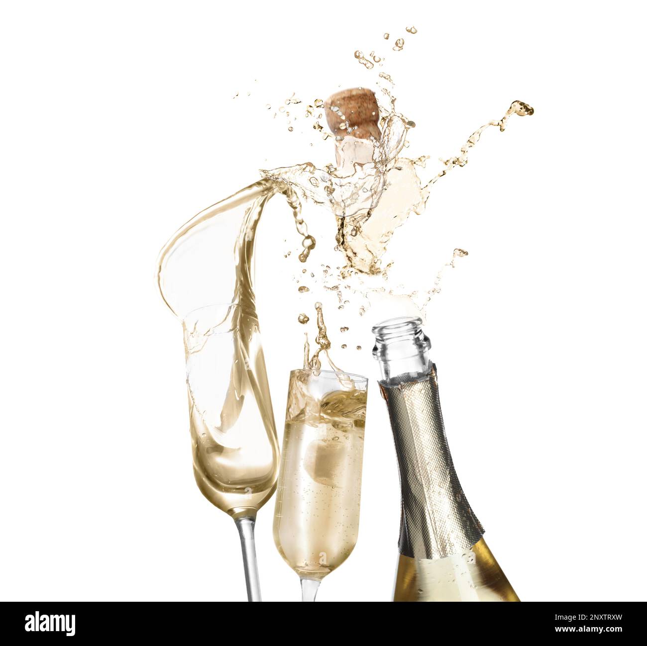 Sparkling wine splashing out of bottle and glasses on white background Stock Photo