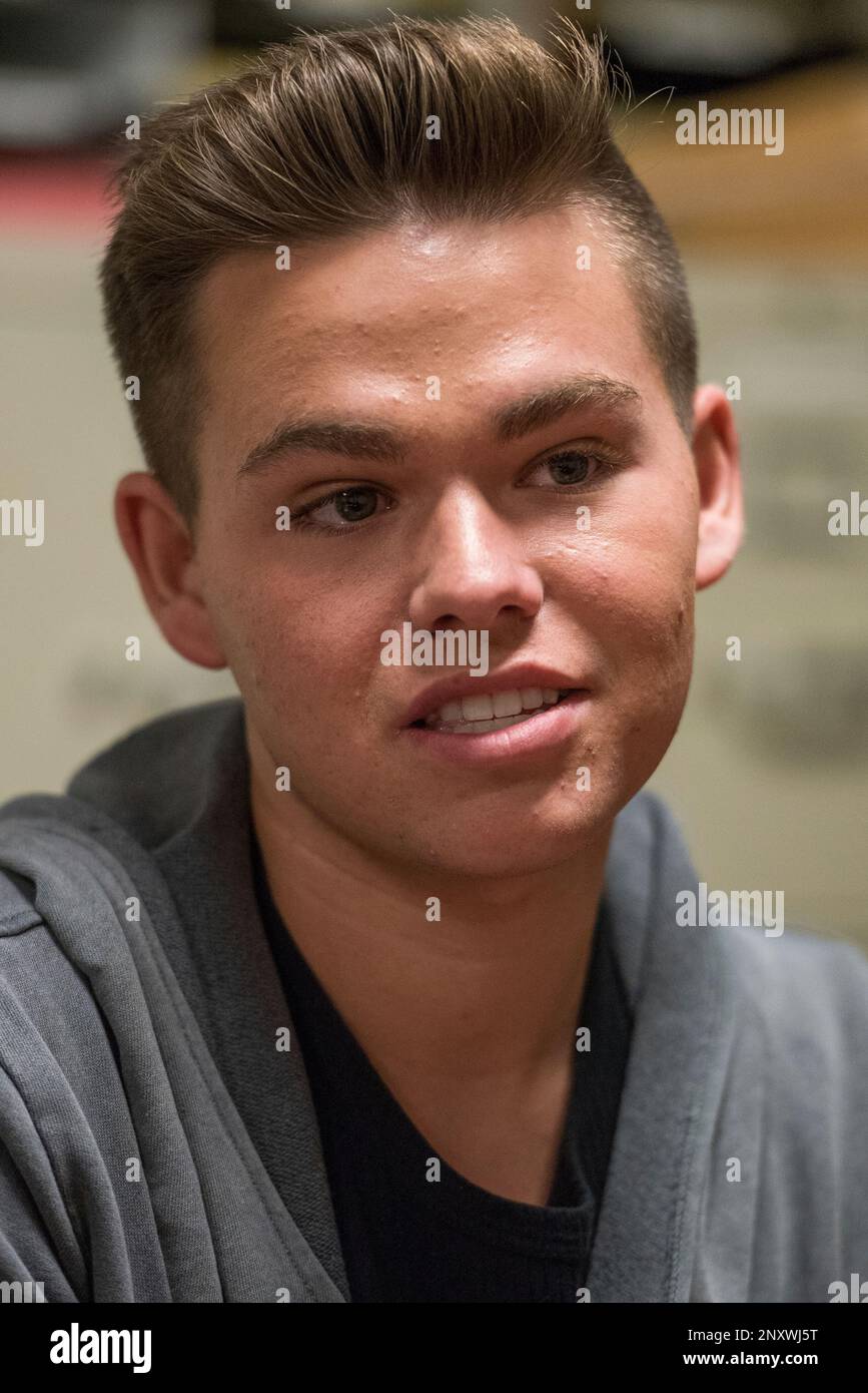 Ina Dec. 6, 2017 photo, Luke Hammond, 18, talks about his experiences