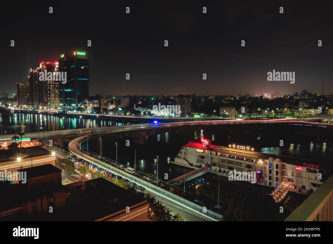 Aerial View of Cairo and boats on the Nile River at Night Stock Photo ...