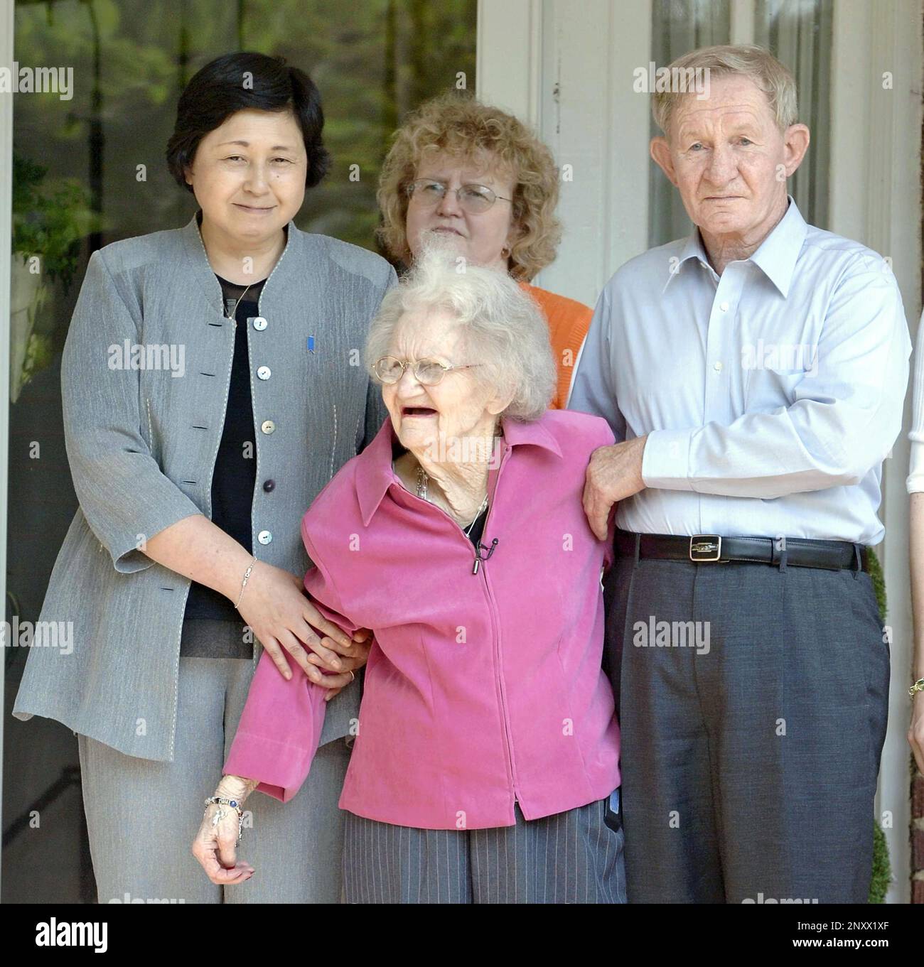 FILE : Charles Jenkins (R), former U.S. Army soldier, meets his mother  Patty Casper (C) with his wife Hitomi Soga (L), former Japanese abductee to  North Korea in North Carolina on June