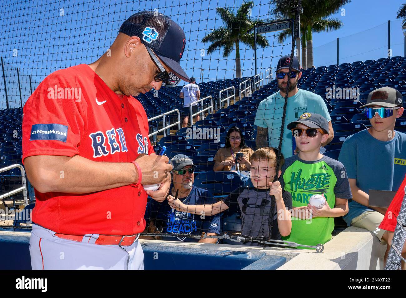 WEST PALM BEACH, FL - MARCH 01: Boston Red Sox manager Alex Cora signs  autographs for fans before an MLB spring training game between the Boston Red  Sox and the Houston Astros
