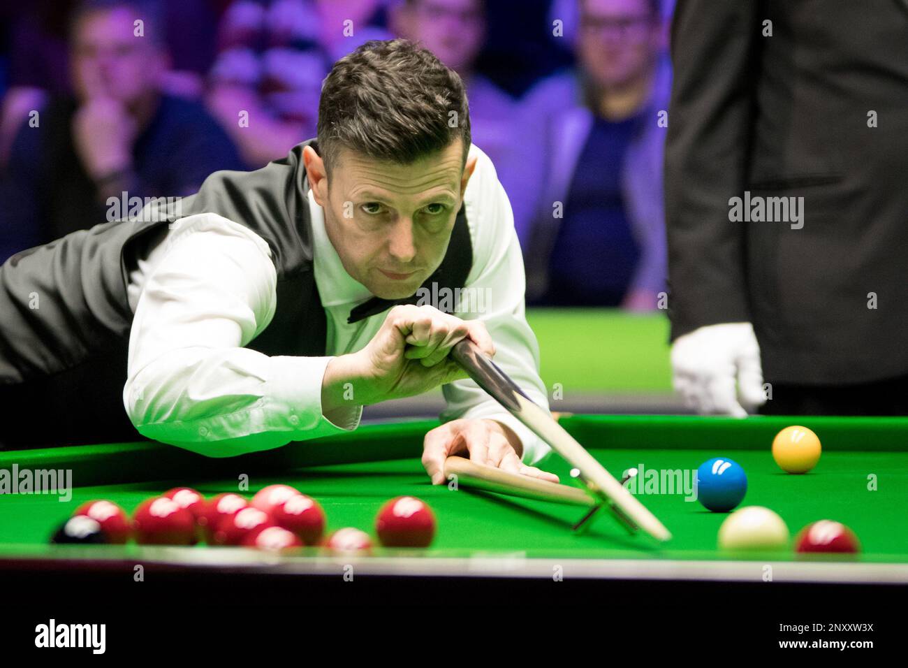 Peter Lines of England plays a shot to Mark Allen of Northern