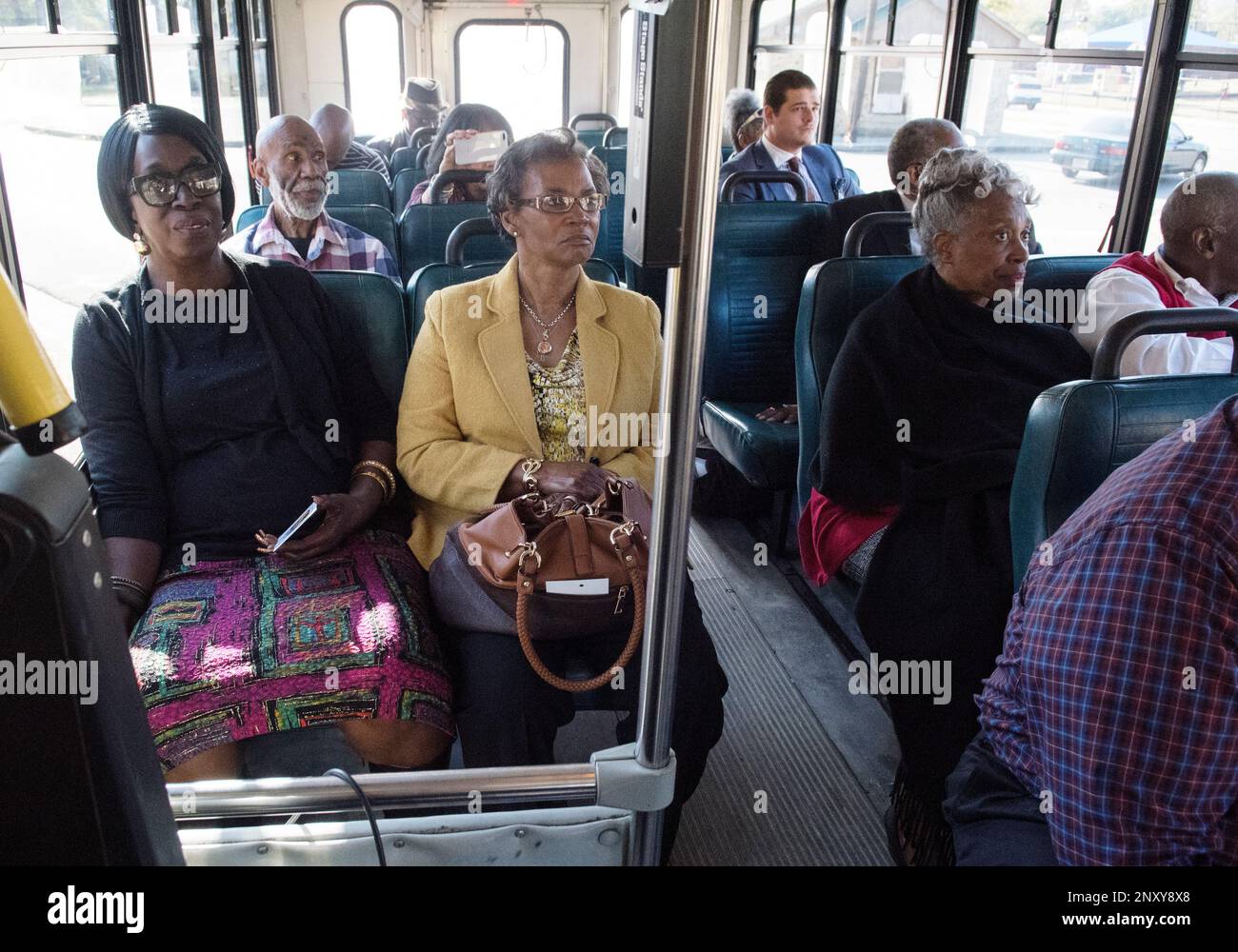 Doris Henson and Freddie, at left, ride a Tyler Transit bus for the second  annual Rosa Parks Day tour of historically significant areas of the city of  Tyler, Texas on Friday Dec.