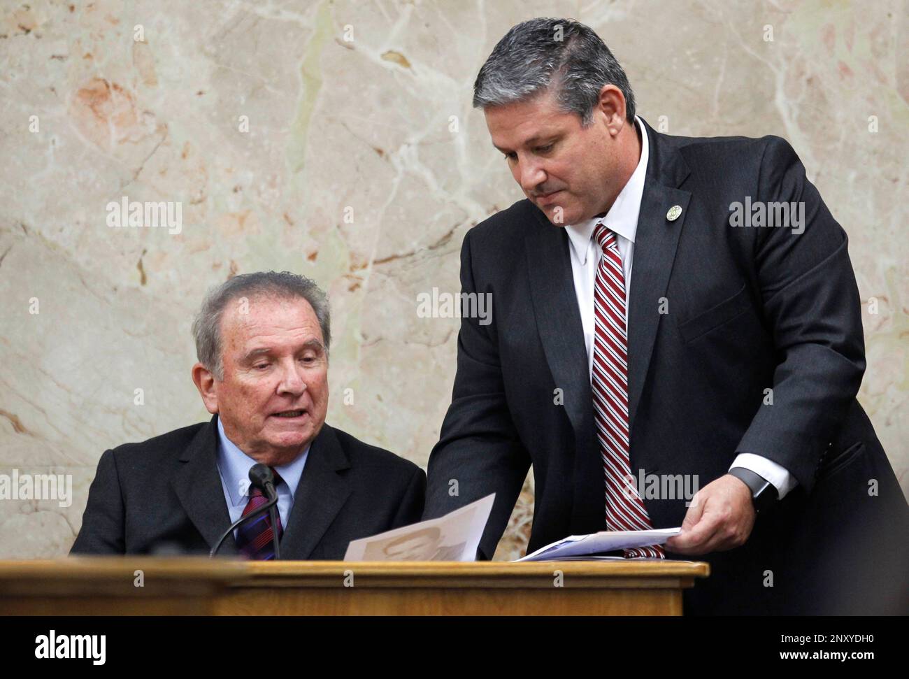 Hidalgo County Assistant District Attorney Michael Garza shows former