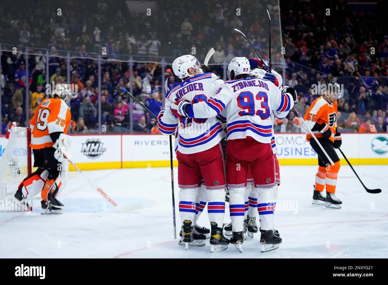 New York Rangers' Mika Zibanejad (93) celebrates with teammates after