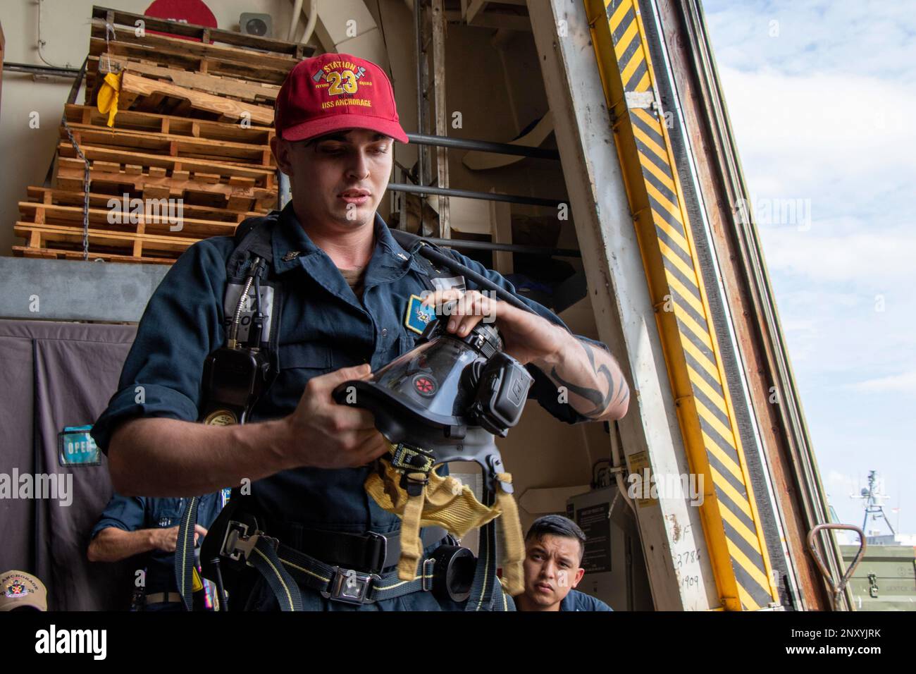 https://c8.alamy.com/comp/2NXYJRK/singapore-feb-23-2023-damage-controlman-2nd-class-eli-johnson-demonstrates-how-to-wear-a-self-contained-breathing-apparatus-scba-during-a-training-session-aboard-amphibious-transport-dock-uss-anchorage-lpd-23-feb-23-2023-sailors-receive-training-in-various-areas-of-damage-control-so-they-can-act-as-first-responders-to-shipboard-casualties-the-makin-island-amphibious-ready-group-comprised-of-amphibious-assault-ship-uss-makin-island-lhd-8-and-amphibious-transport-docks-uss-anchorage-lpd-23-and-uss-john-p-murtha-lpd-26-is-operating-in-the-us-7th-fleet-area-of-operations-2NXYJRK.jpg