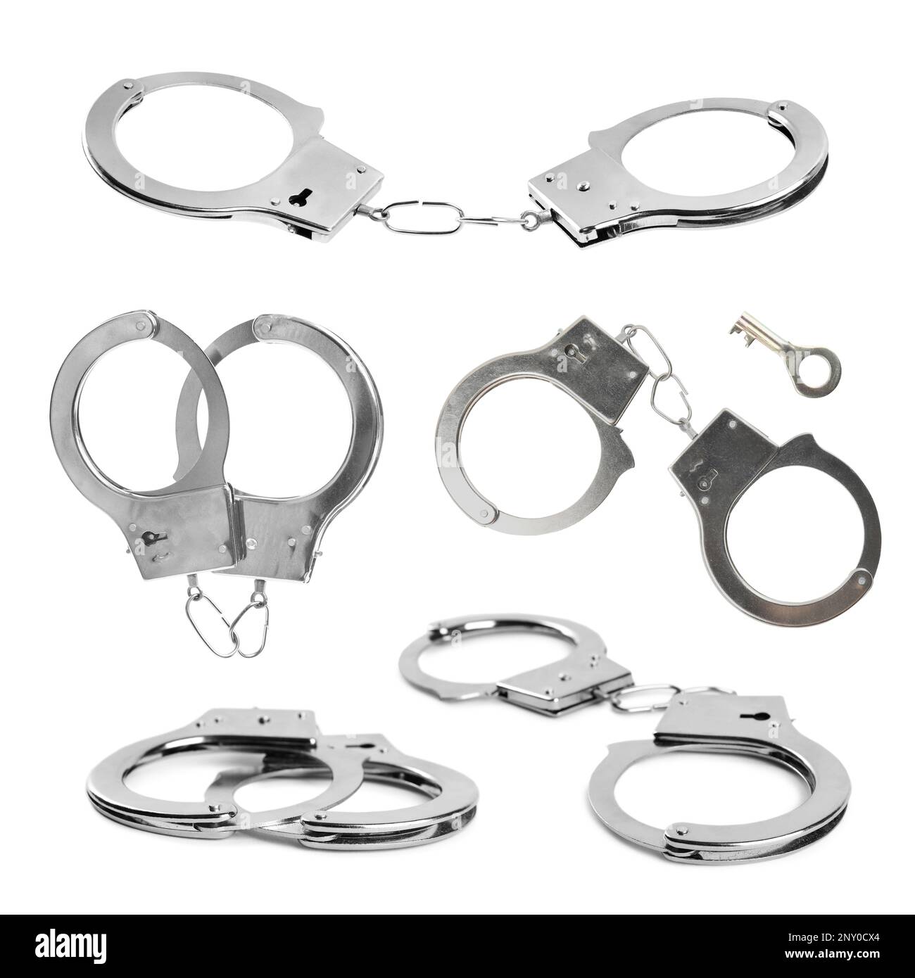 Set with classic chain handcuffs on white background Stock Photo