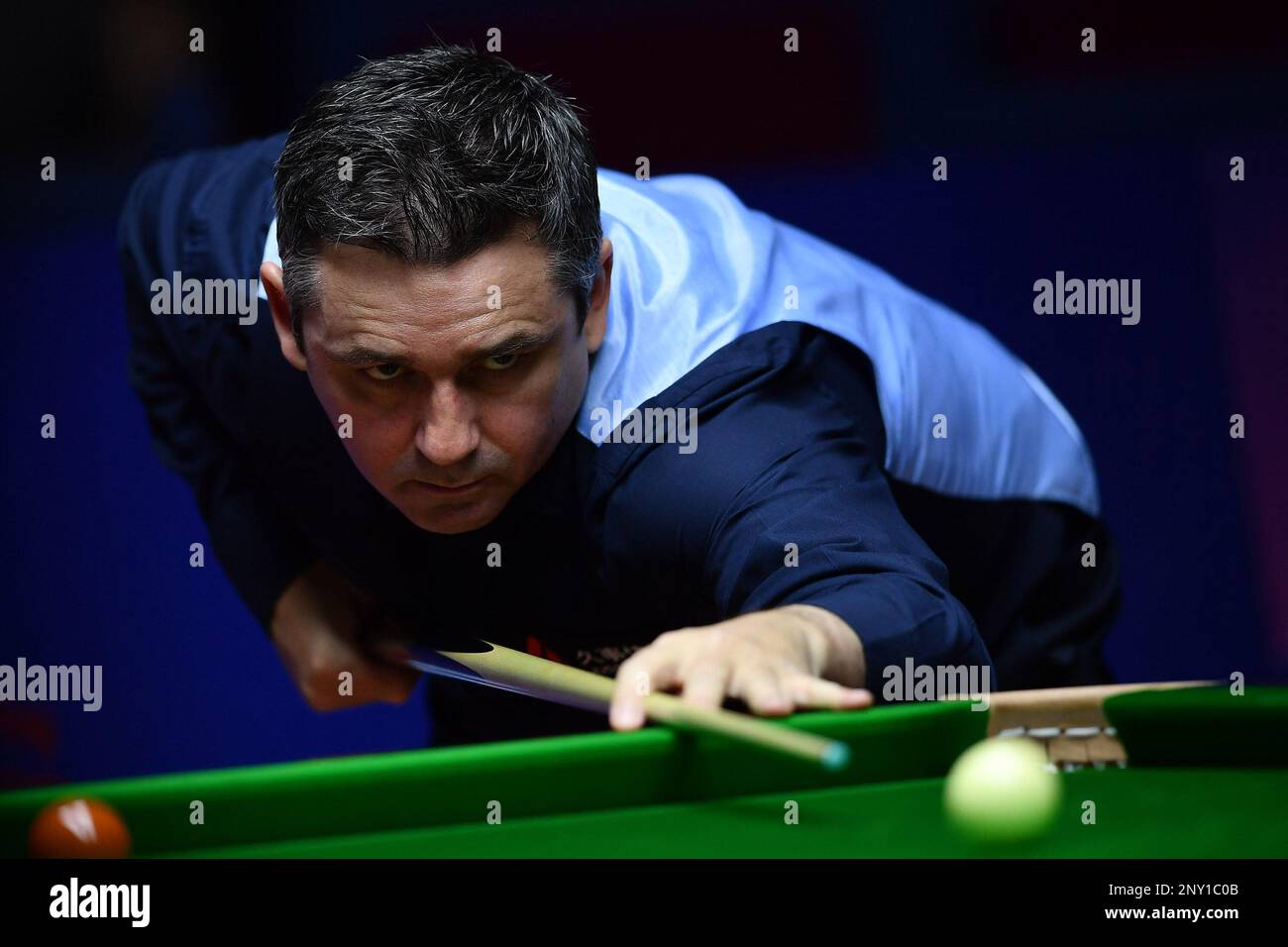 Alan McManus of Scotland plays a shot to Mark Selby of England in their second round match during the 2017 Shanghai Masters snooker tournament in Shanghai, China, 15 November 2017.Mark Selby defeated