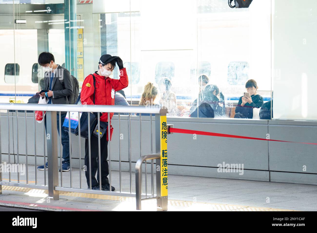 Tokyo, Japan. 28th Feb, 2023. JR East cleaning crews wait for their