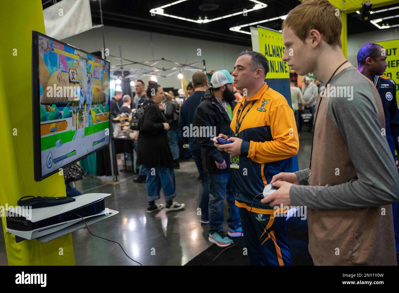 U.S. Navy Counselor 1st Class Joshua Watson, assigned to the Navy’s esports team, Goats & Glory, plays Dragon Ball Z at FAN EXPO Portland. Goats & Glory is dedicated to outreach and engagement with members of the gaming community, showcasing life and opportunities available in the Navy. Stock Photo