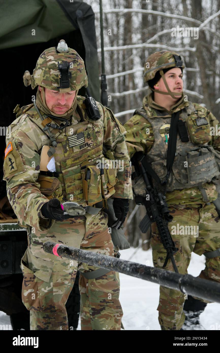 Soldier Using Compass A Soldier from the 1-120th Field Artillery Regiment, Wisconsin Army ...