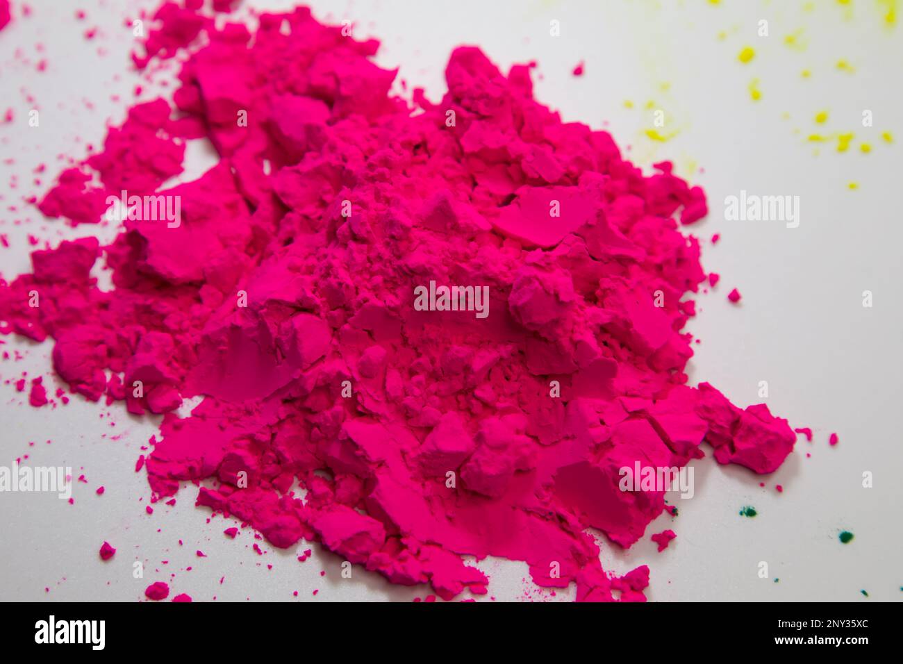 Closeup details of Holi powder on white background. Happy holi. Indian holi festival. Stock Photo