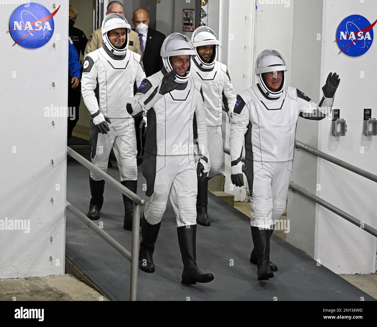 NASA Astronauts Warren Hoburg and Stephen Bowen (front l and r), followed by Russian Cosmonaut Andrey Fedayev and UAE Astronaut Sultan Al Neyadi (rear l to r) walk out from the Neil Armstrong Operations and Checkout Building at the Kennedy Space Center, Florida on Sunday, February 26, 2023.The crew will be launched to the International Space Station on the SpaceX Crew Dragon spacecraft. Photo by Joe Marino/UPI Credit: UPI/Alamy Live News Stock Photo
