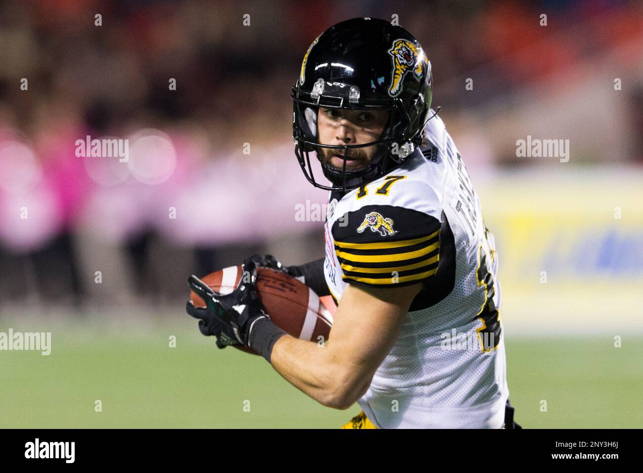 October 27, 2017: Hamilton Tiger-Cats wide receiver Luke Tasker (17) turns to run with the ball during the CFL game between Hamilton and Ottawa Redblacks at TD Place Stadium in Ottawa,