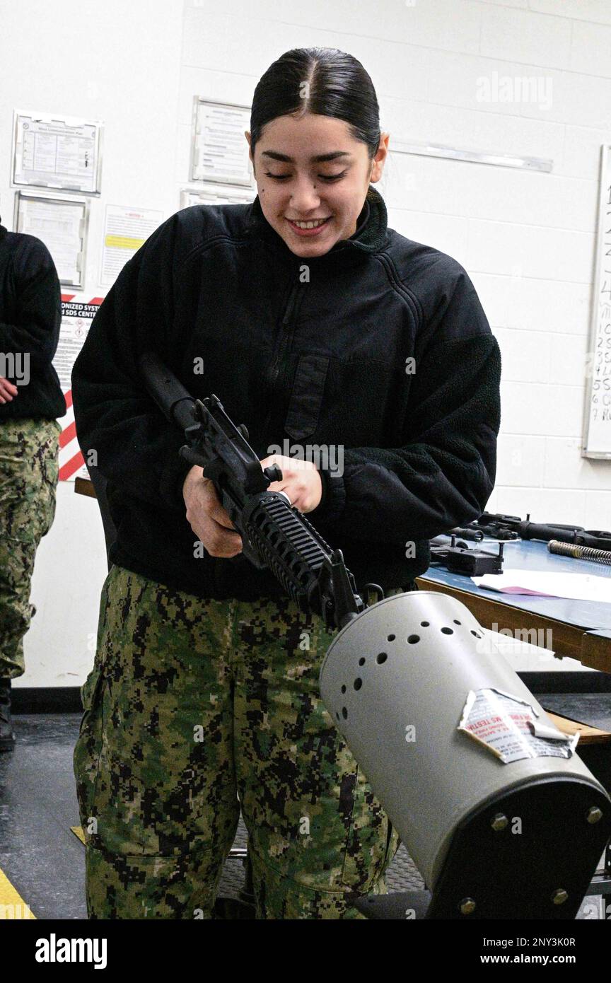 GREAT LAKES, Ill. (Feb. 1, 2023) Seaman Recruit Ashley Maldonado, a student at Surface Combat Systems Training Command Great Lakes, clears an M4 carbine at Gunner's Mate (GM) 'A' School. GM “A” School gives accession Sailors technical training in weapons maintenance electricity, electronics and operation of launch systems and torpedoes. Stock Photo