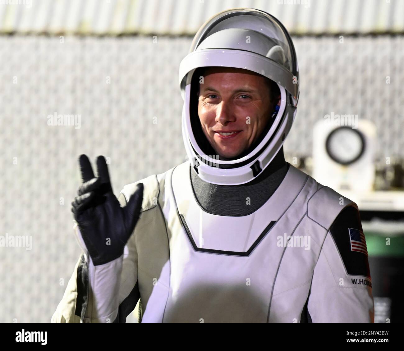 NASA Astronaut Warren Hoburg waves to friends and family members after walking out from the Neil Armstrong Operations and Checkout Building at the Kennedy Space Center, Florida on Wednesday March 1, 2023. Photo by Joe Marino/UPI Credit: UPI/Alamy Live News Stock Photo