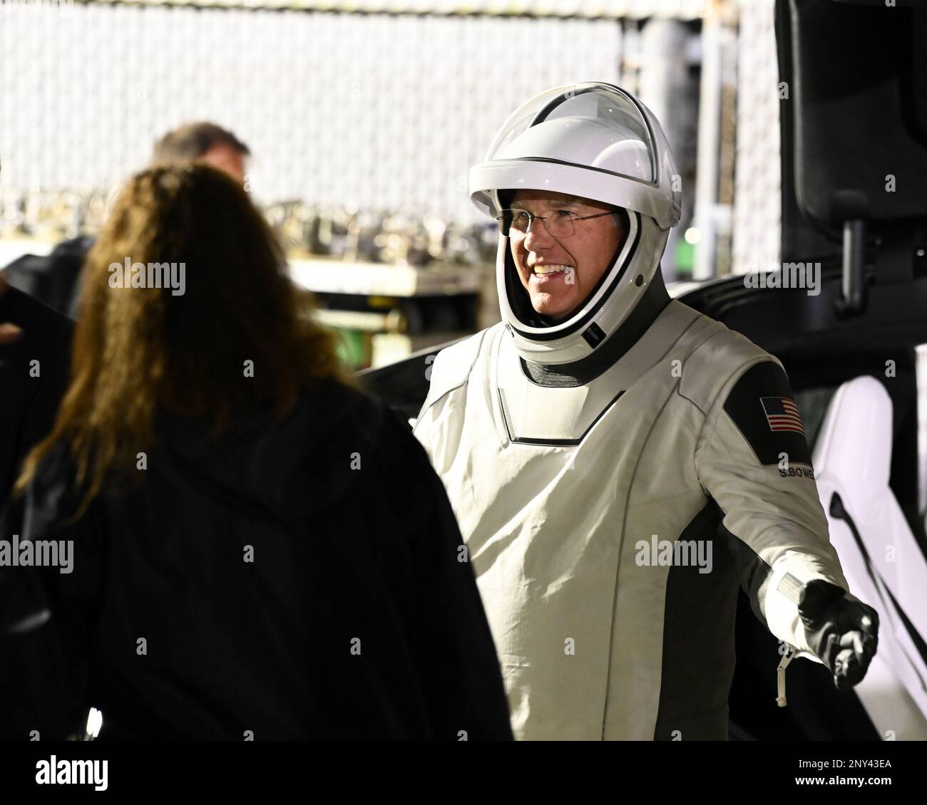 NASA Astronaut Stephen Bowen waves to friends and family members after walking out from the Neil Armstrong Operations and Checkout Building at the Kennedy Space Center, Florida on Wednesday, March 1, 2023. Photo by Joe Marino/UPI Credit: UPI/Alamy Live News Stock Photo