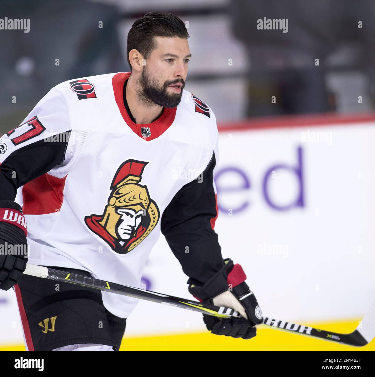 NHL profile photo on Ottawa Senators player Nate Thompson at a game against the Calgary Flames