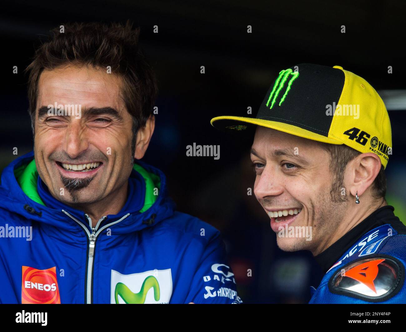 October 21, 2017 - Melbourne, Victoria, Australia - Italian rider Valentino  Rossi (#46) of Movistar Yamaha MotoGP (R) has a laugh with his data engineer  Matteo Flamigni (L) before the third free
