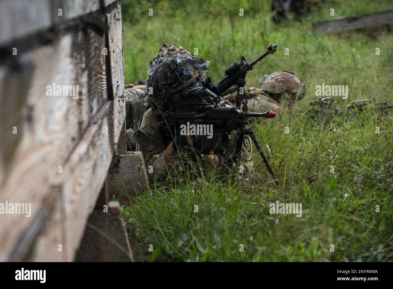 A U.S. Army Soldier assigned to Charlie Company, 2nd Battalion, 35th Infantry Regiment, 3rd Infantry Brigade Combat Team, 25th Infantry Division participates in a squad live fire exercise on Schofield Barracks, Hawaii, Feb. 23, 2023. Squads demonstrated their knowledge while performing essential battle drill tasks during day and night time live fire training. (U.S. Army photo by Spc. Darbi Colson/3rd Infantry Brigade Combat Team) Stock Photo