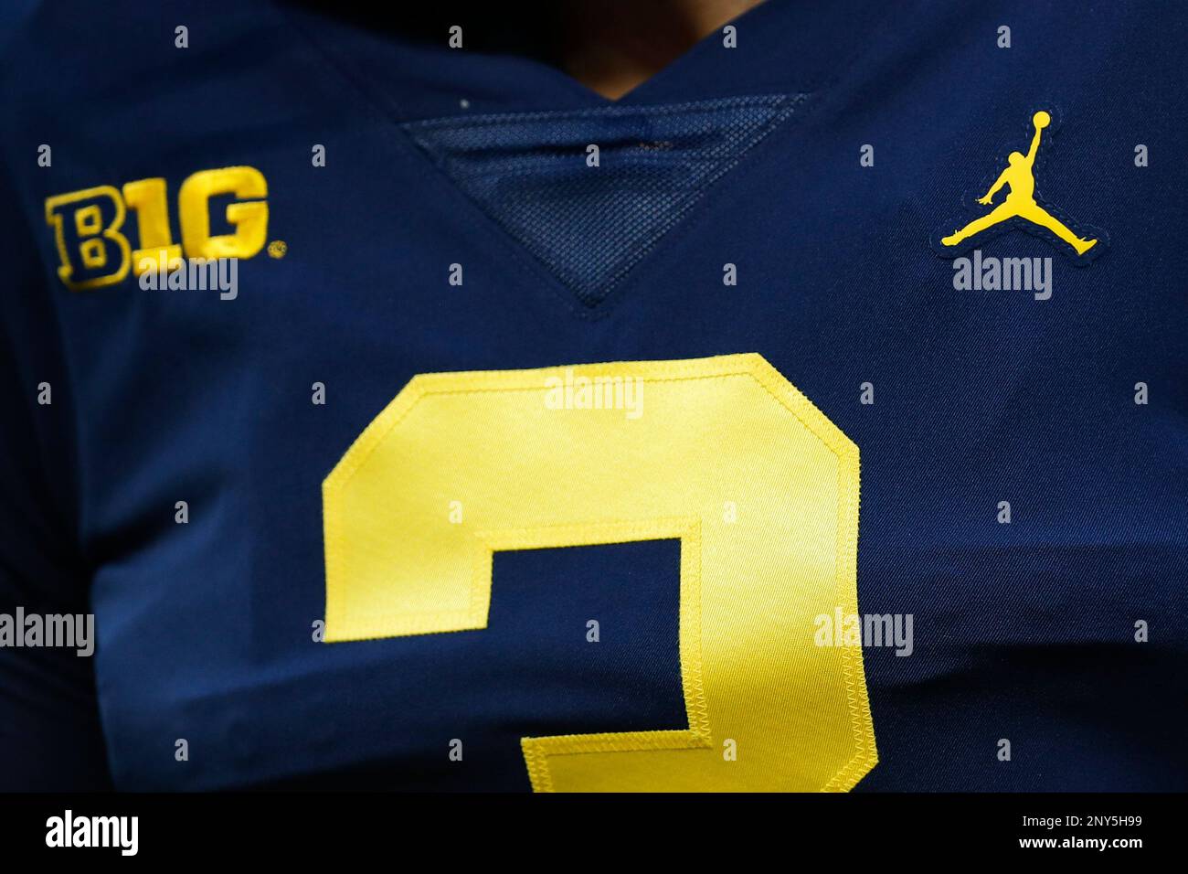 A detail view of the Jordan Brand Nike logo on a University of Michigan Wolverines jersey prior to an NCAA college football game against the Michigan State University Spartans on Saturday Oct